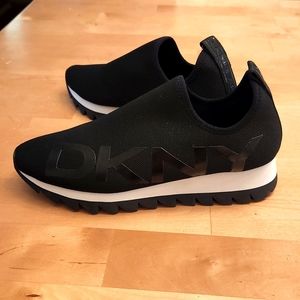 Black DKNY slip on sneakers